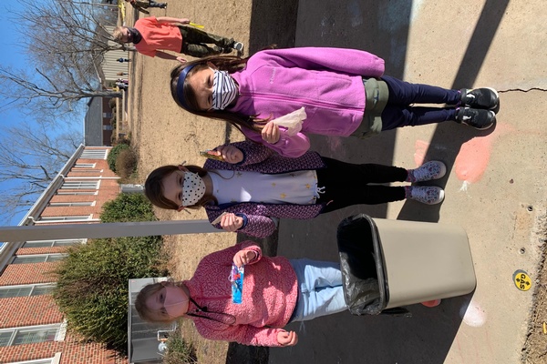 Students of East Elementary picking up litter
